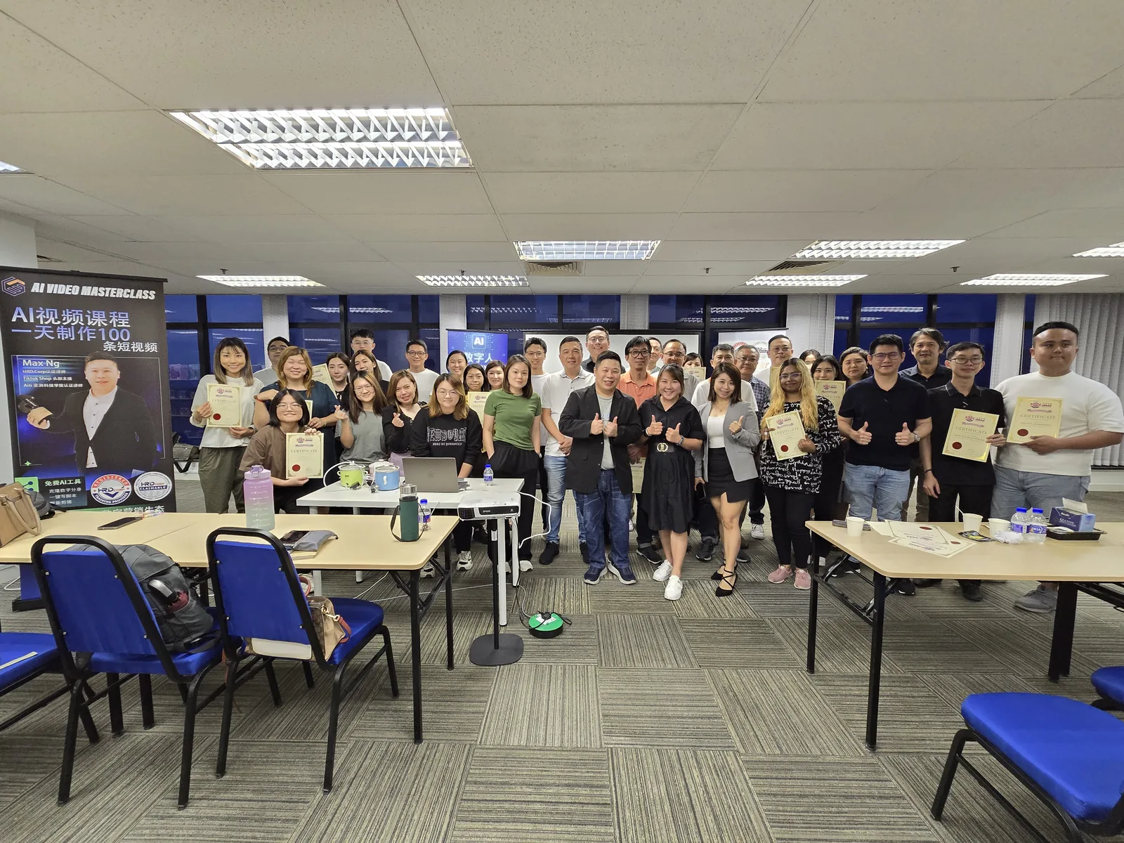 Group photo of participants holding their certificates after the AIGC digital human and AI video masterclass