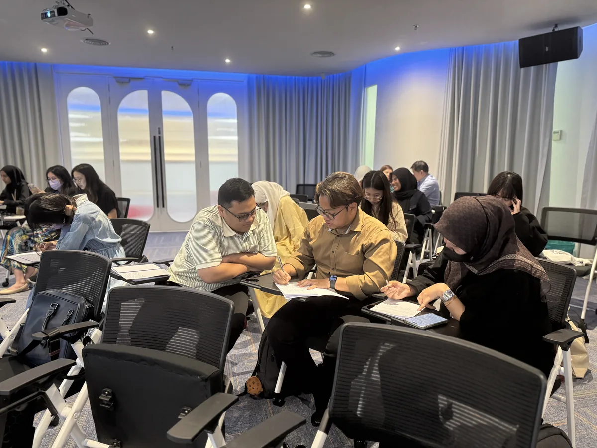 ECkare team members working together during a group exercise
