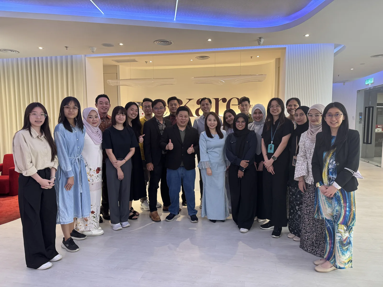 Group photo of the ECkare team with AIGC Malaysia after the TikTok Live and AI video training