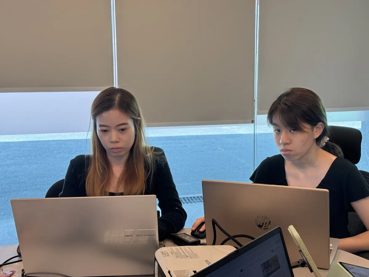 Participants creating their AI videos during the training