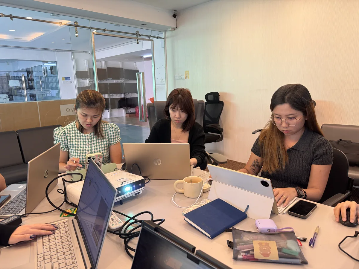 Participants focused on their AI video projects during the training