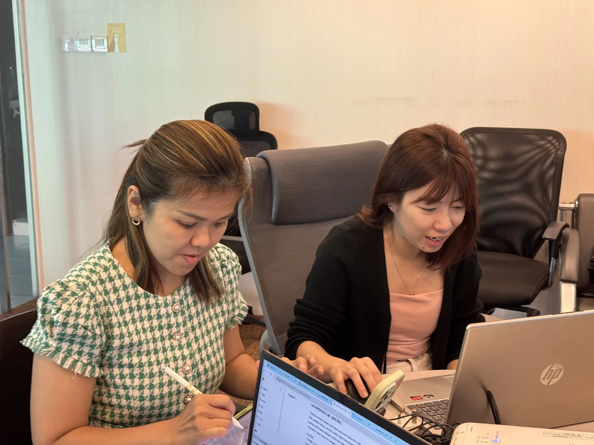 Havona Hotel staff taking notes and practising during the AI training