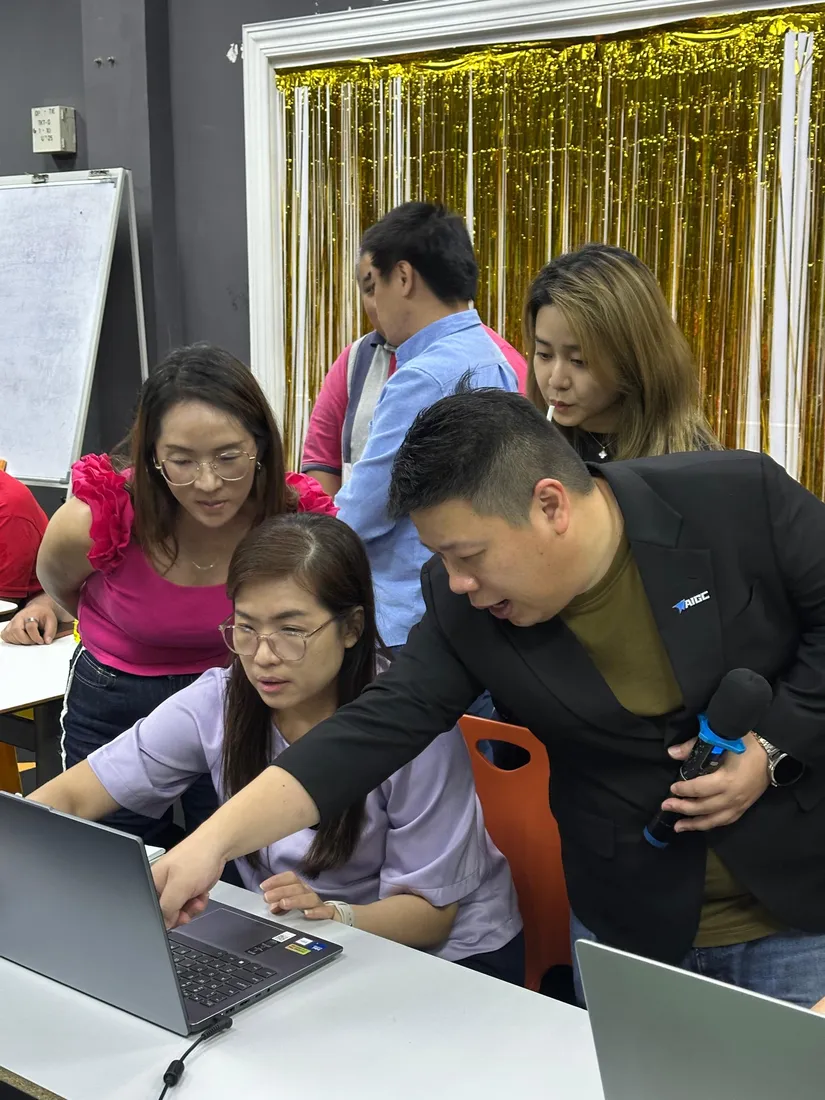 An IQI property agent learning to use AI video tools at the AIGC Malaysia workshop