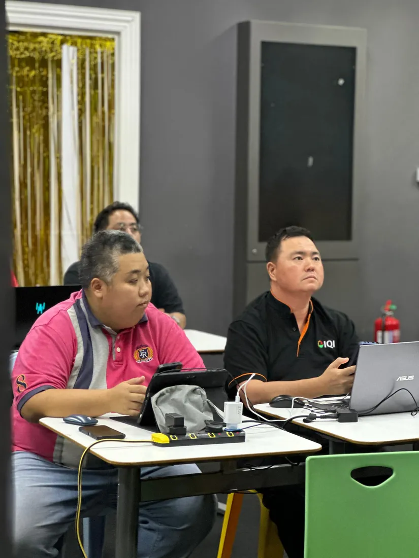 IQI property agents editing an AI-generated property video on their devices