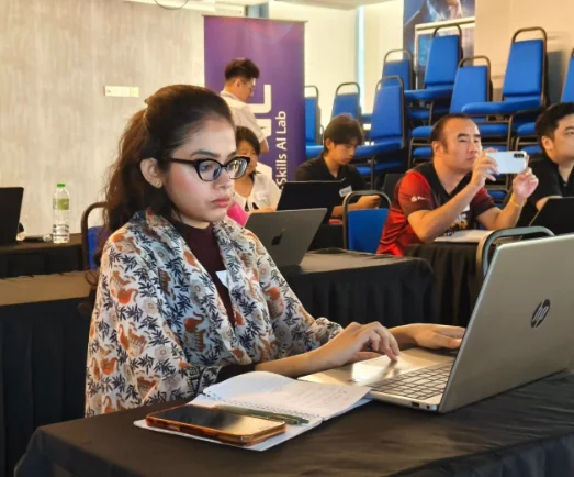 A participant focused on creating her AI short video